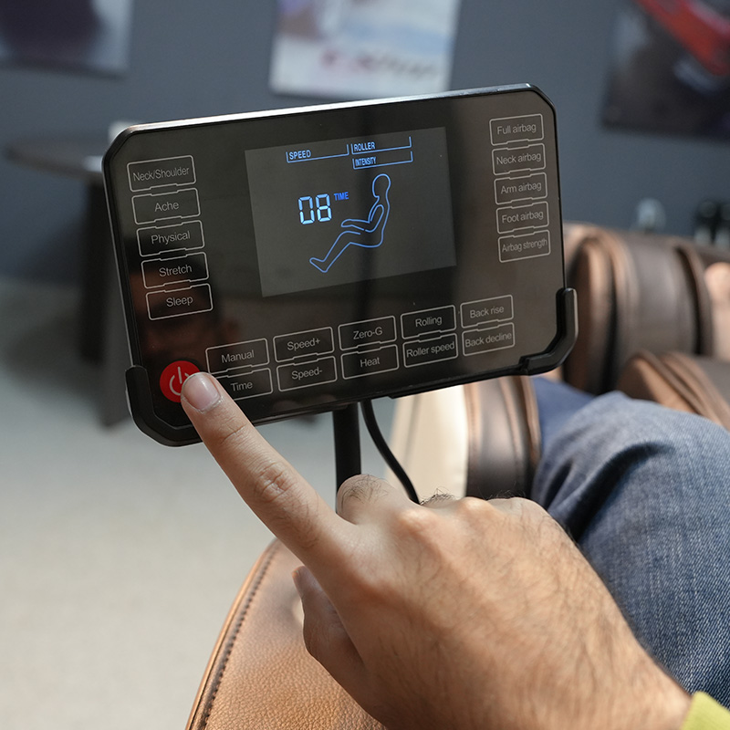 Massage chair control panel in use