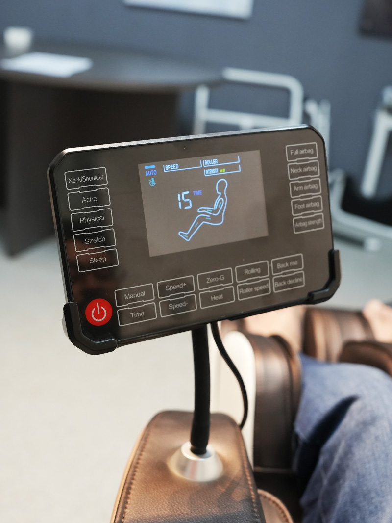 Control panel attached to massage chair arm by JCBL group